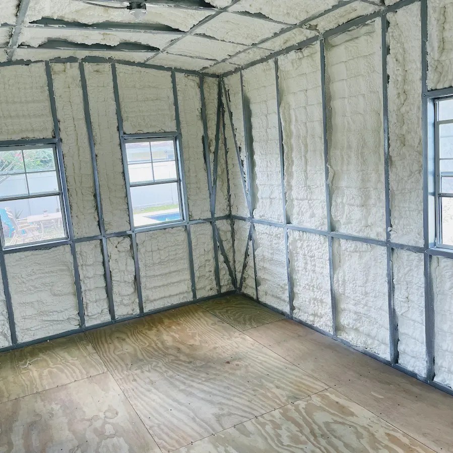Closed-cell spray foam insulation applied to wall cavities in a residential project in Edwardsville