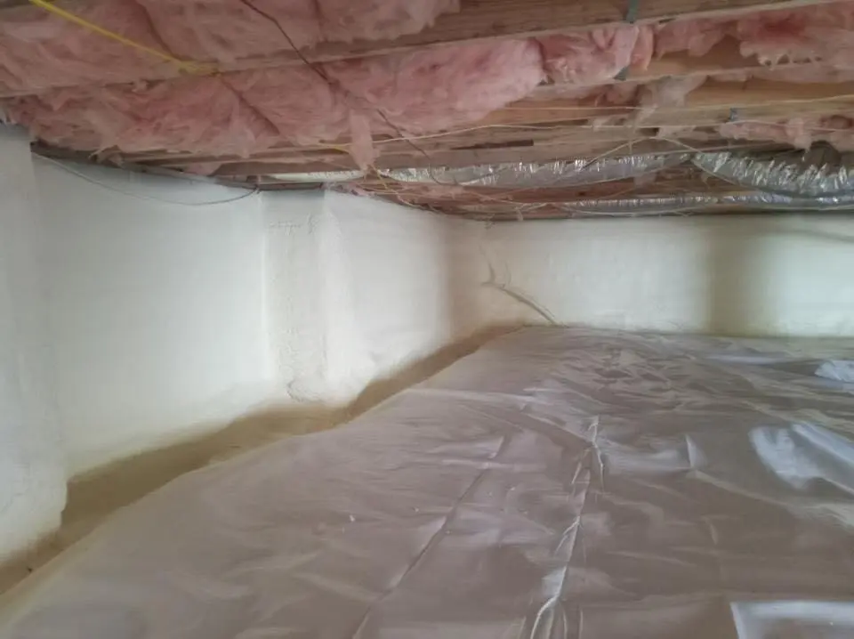 Crawl space encapsulation with closed-cell spray foam for Commercial Roof Restoration in Edwardsville